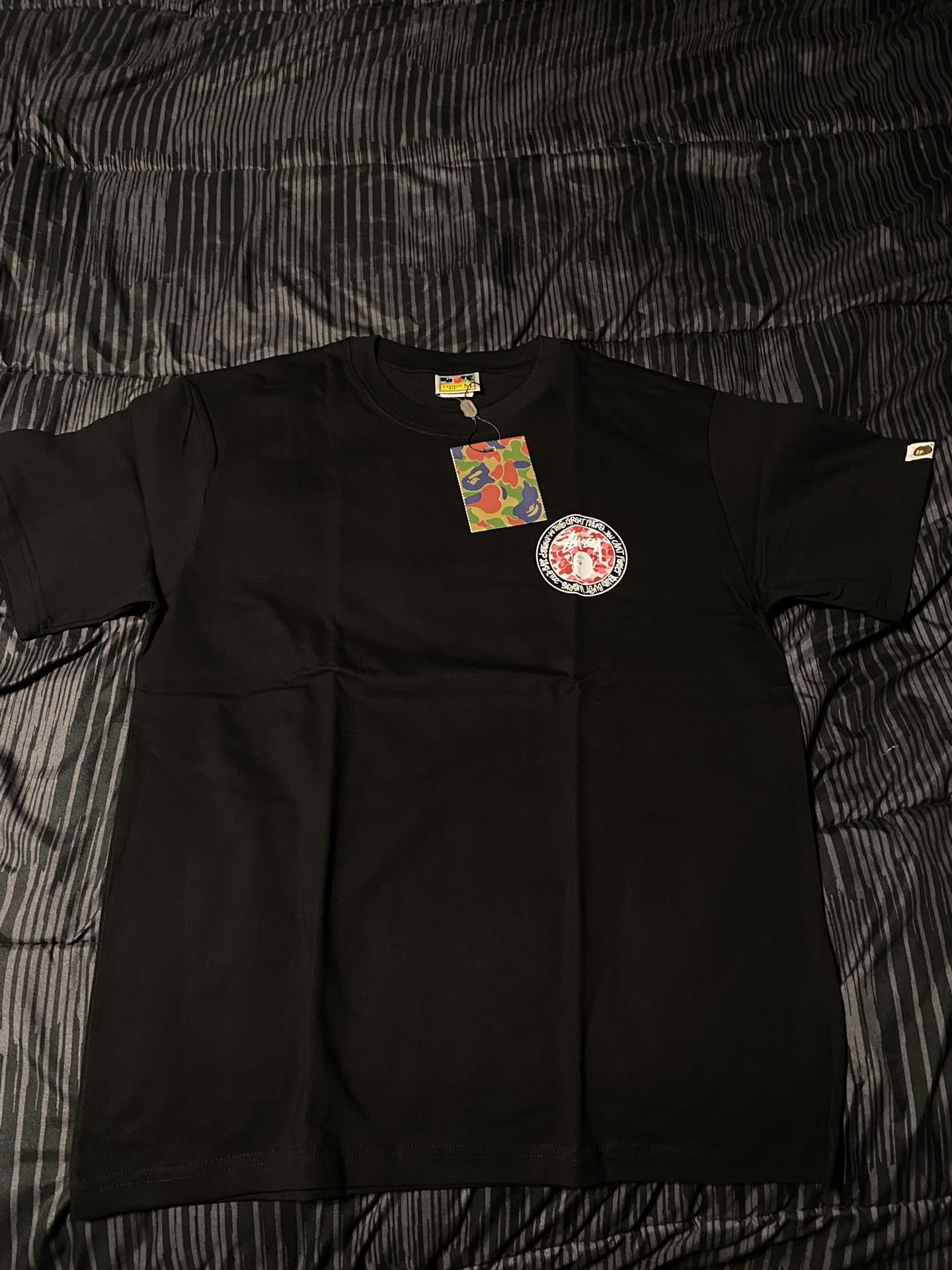 Pink/Red Bape shirt.