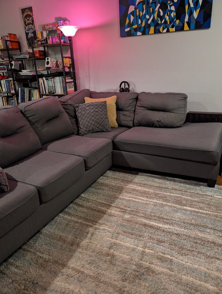 2-piece Sectional With Queen Pull Out Bed And Ottoman
