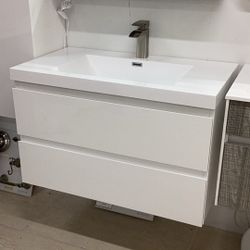 Brand new 36” glossy white floating vanity available for pick up 