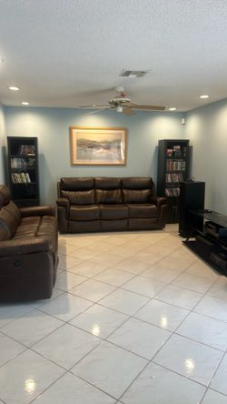 Moving sale, genuine, leather, dual reclining sofas