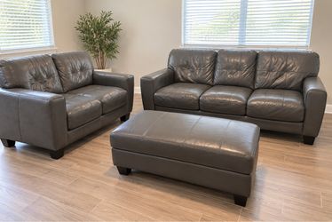 Gray three seat leather living room set