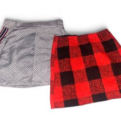 Two skirts including Forever 21 red and black size S & Haute Monde black and white with stripe skirt