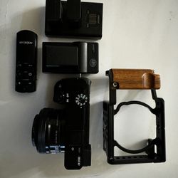 A6100 W/cage, It Lens, And Batteries 