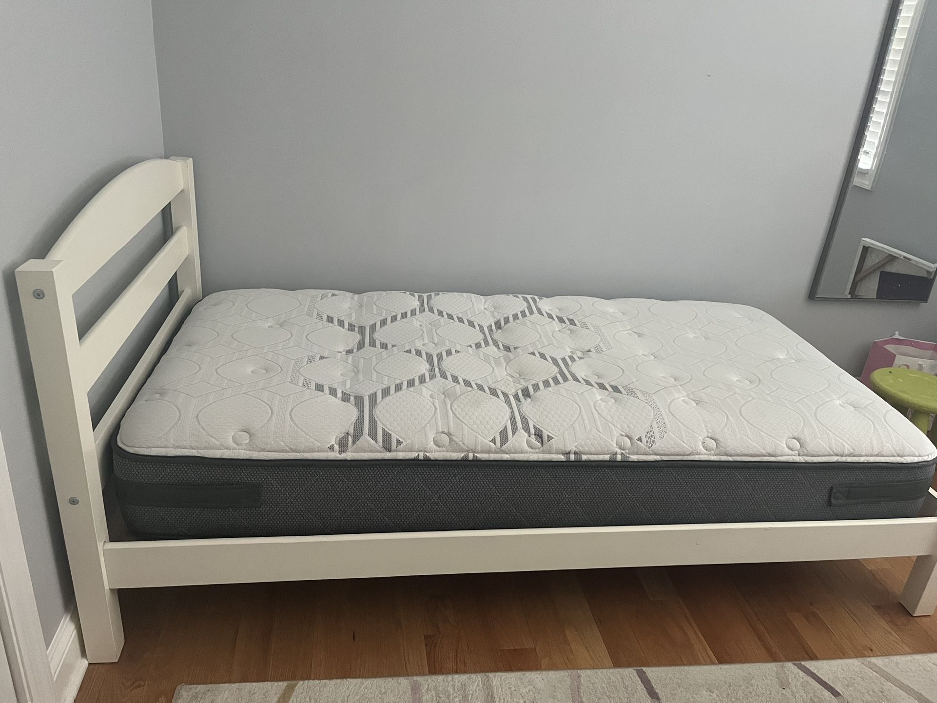 Uses wood bed frame with mattress in perfect condition.