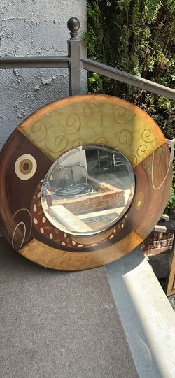 Round mirror and 2 pictures