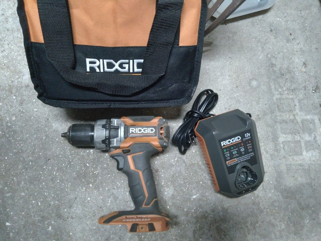 Rigid drill like new with charging port and bag