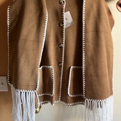 Camel Brown Fringe Coat with White Crochet Trim and Fringes. Features button closure and pockets. Will keep you warm. Great gift. Size L