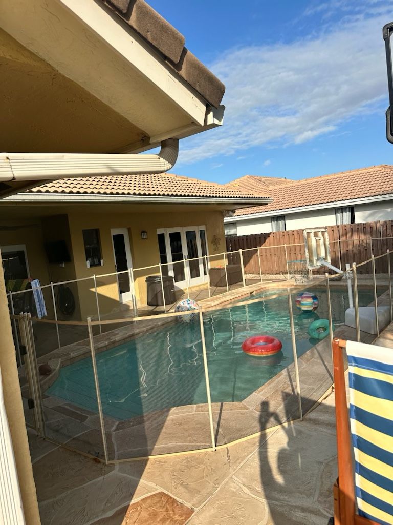 Beige pool fencing with gate 1044 total feet