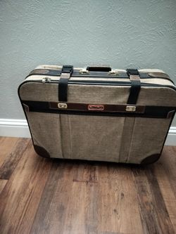 Vintage Oscar de la Renta luggage suitcase with wheels