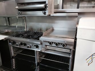 Garland G60-6R24GS Natural Gas 6 Burner 60" Range with 24" Raised Griddle / Broiler, Standard Oven, and Storage Base - 269,000 BTU