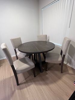 Table and Four Chairs