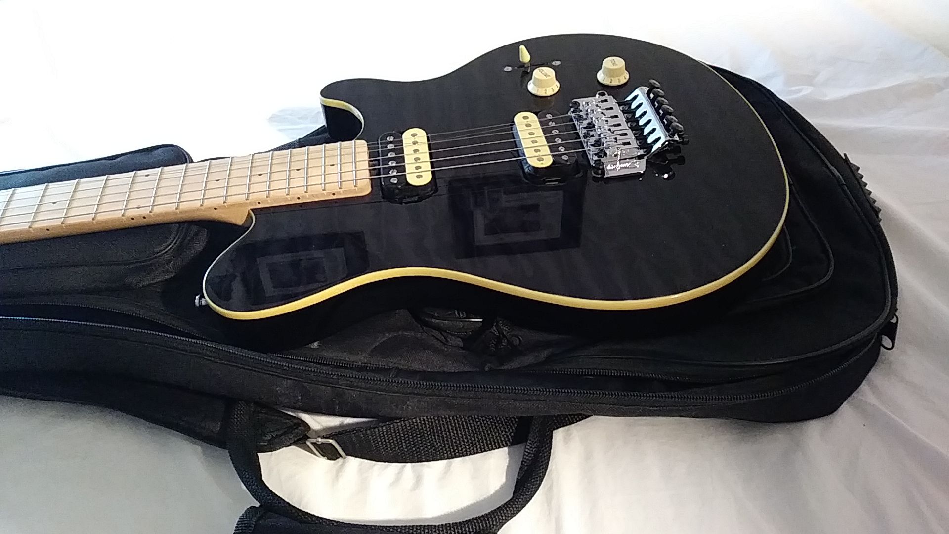 Sterling by Music Man: AX4 Sub Series Electric Guitar (Transparent black)