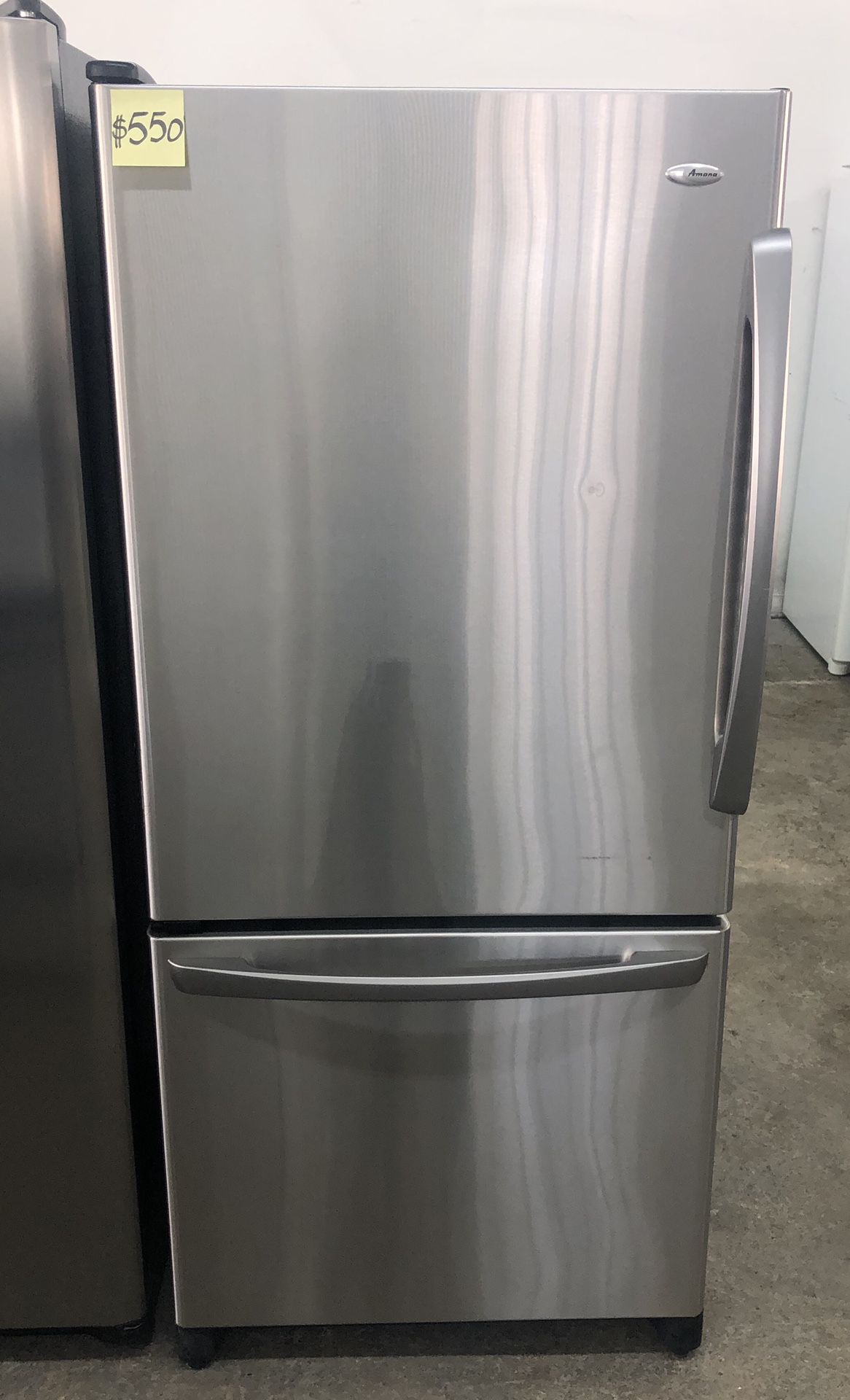 Comes with free 6 Months Warranty-like new 29 5/8” wide bottom freezer stainless Amana
