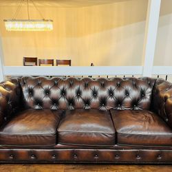 Hutchinson leather sectional deals