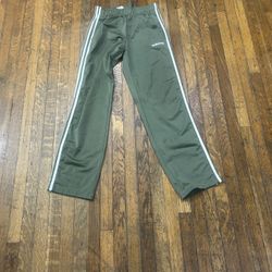 Item 0443 Adidas olive green track pants adidas size small —- small stain on leg see all pics