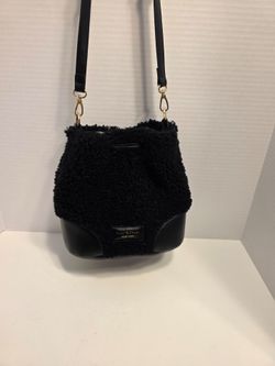 This Isaac Mizrahi black teddy faux sherpa and leather hobo bucket bag