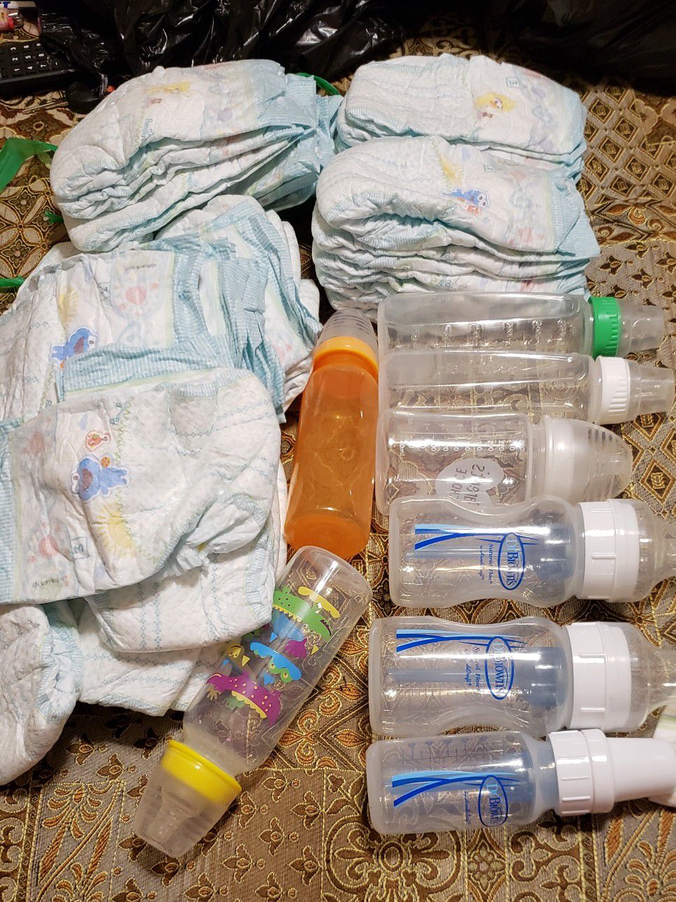 I have a lot of baby things One z's sleepers Toys 10 baby bottles 3R doctor Brown All for $50 there for boys then I have a girls crib set for $15