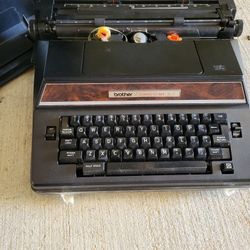 Brother Correct-O-Ball XL-I Model 7300 Portable Electric Typewriter.