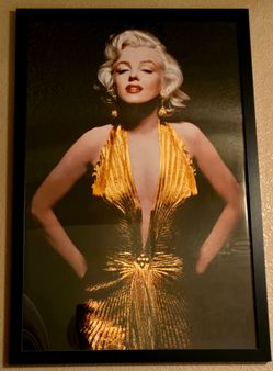 Marilyn Monroe in a gold dress