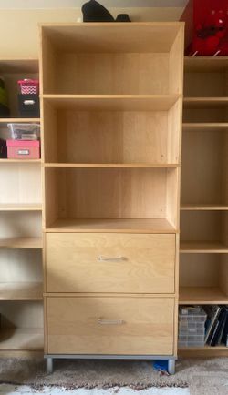 Tall filing cabinet with shelf
