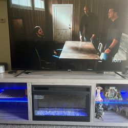 65 Inch Flat Screen Tv And Tv Fire Place Stand 