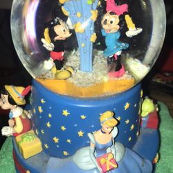 Disney world hundred year old birthday snow globe
