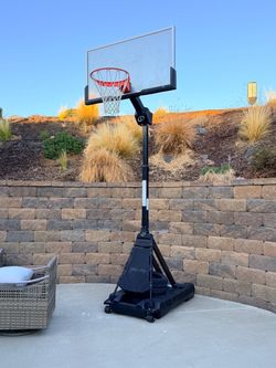Spalding Portable Basketball Hoop. Spalding "The Beast" 60" Glass Portable Basketball Hoop System