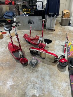 Electric Scooter City Buzz. One works other are for parts.