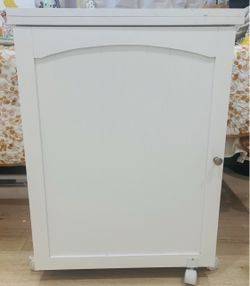 White wooden rolling craft cabinet/cart