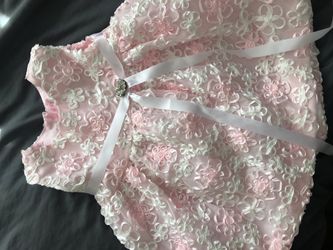 Super cute brand new can fit from 6-12 months depending baby