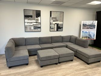 Large Gray Modular Sectional Sofa with Ottomans