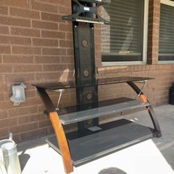 TV Stand with Mount and Glass Shelving. Living Room Entertainment Center