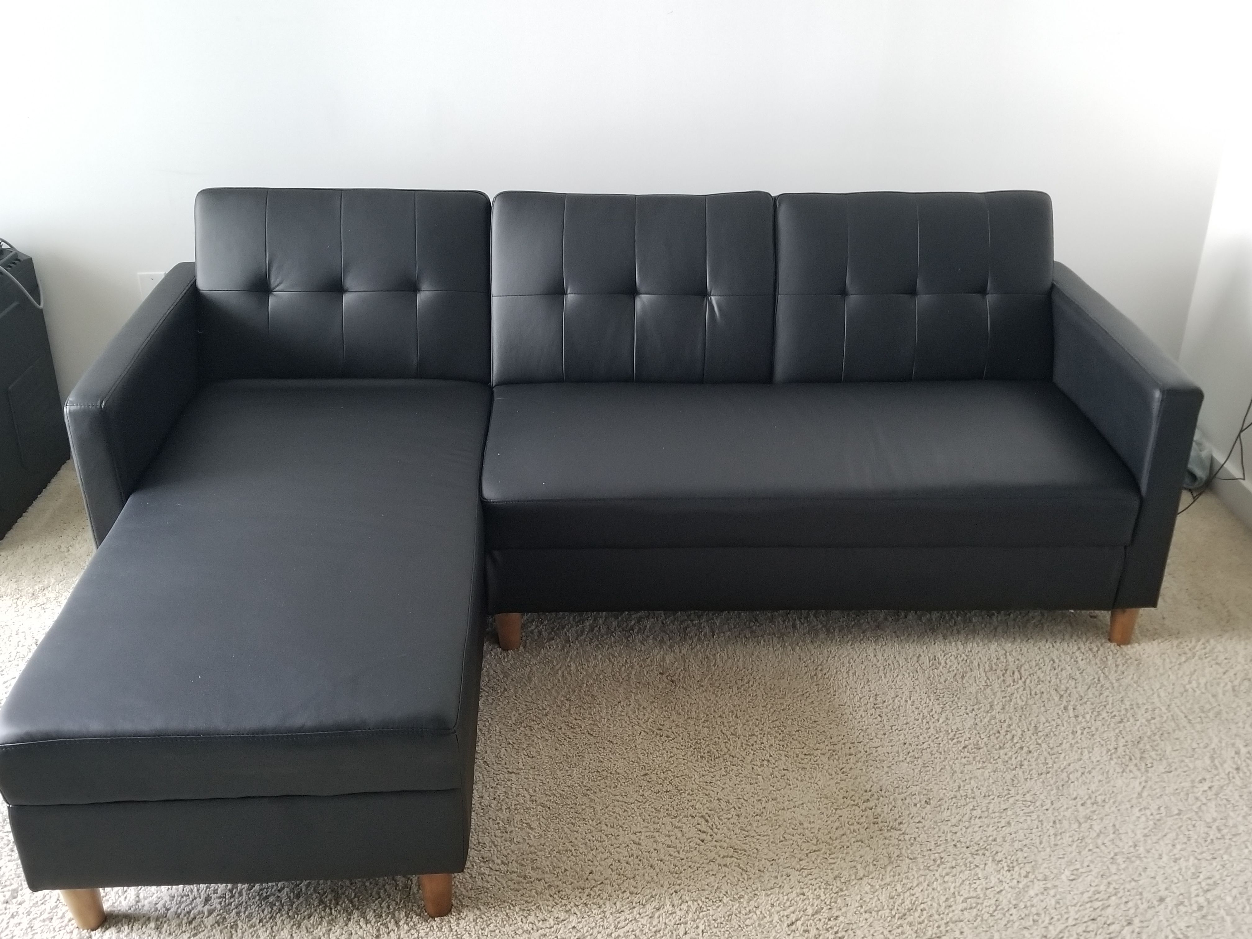 L shape sectional turns into a futon. $450 or best offer