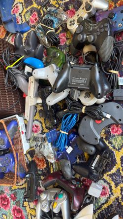 Big lot assorted video game controllers $75 for repair or parts
