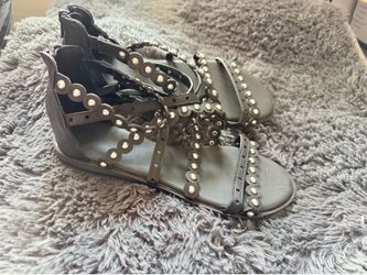 Women’s black and silver sandals size 7.5