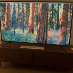 69" Mid-Century Modern TV Stand with Sliding Doors & USB Charging, Walnut