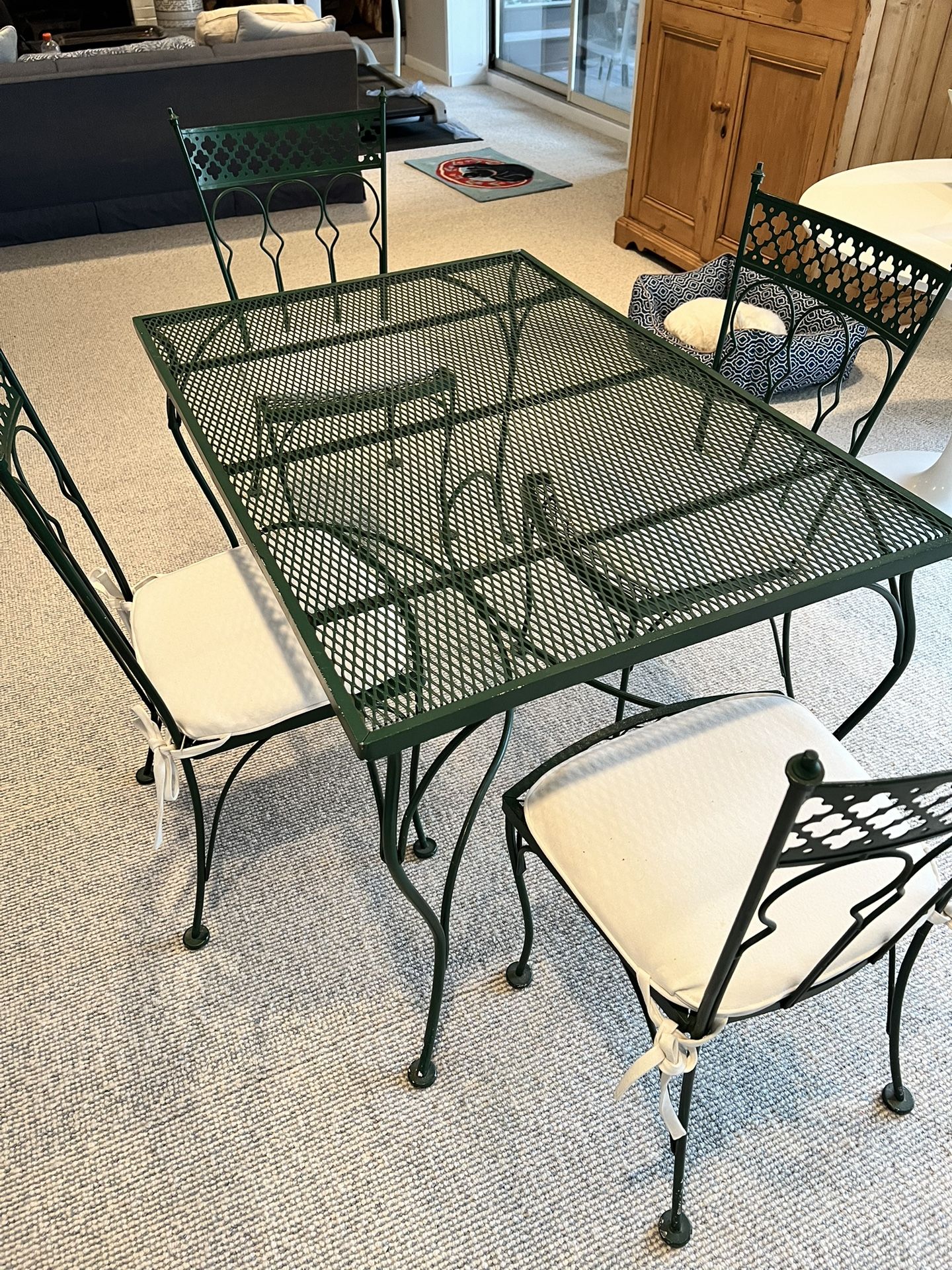 Wrought iron table and 4 chairs