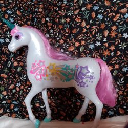 Barbies Light Up Magical Unicorn 