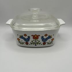 Vintage Corning Ware A-1 1/2-B 1.5-quart casserole dish with a Pyrex A-7-C lid