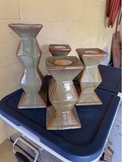 Staggered ceramic pillar candle holder