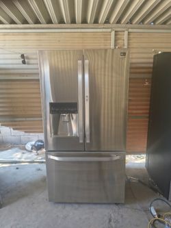 Kenmore Refrigerator stainless steel 4 door