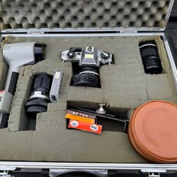 NIKON FG 35MM CAMERA and ACCESSORIES MANUAL LENS , FILTERS, LIGHT, AND PROFESSIONAL CASE 