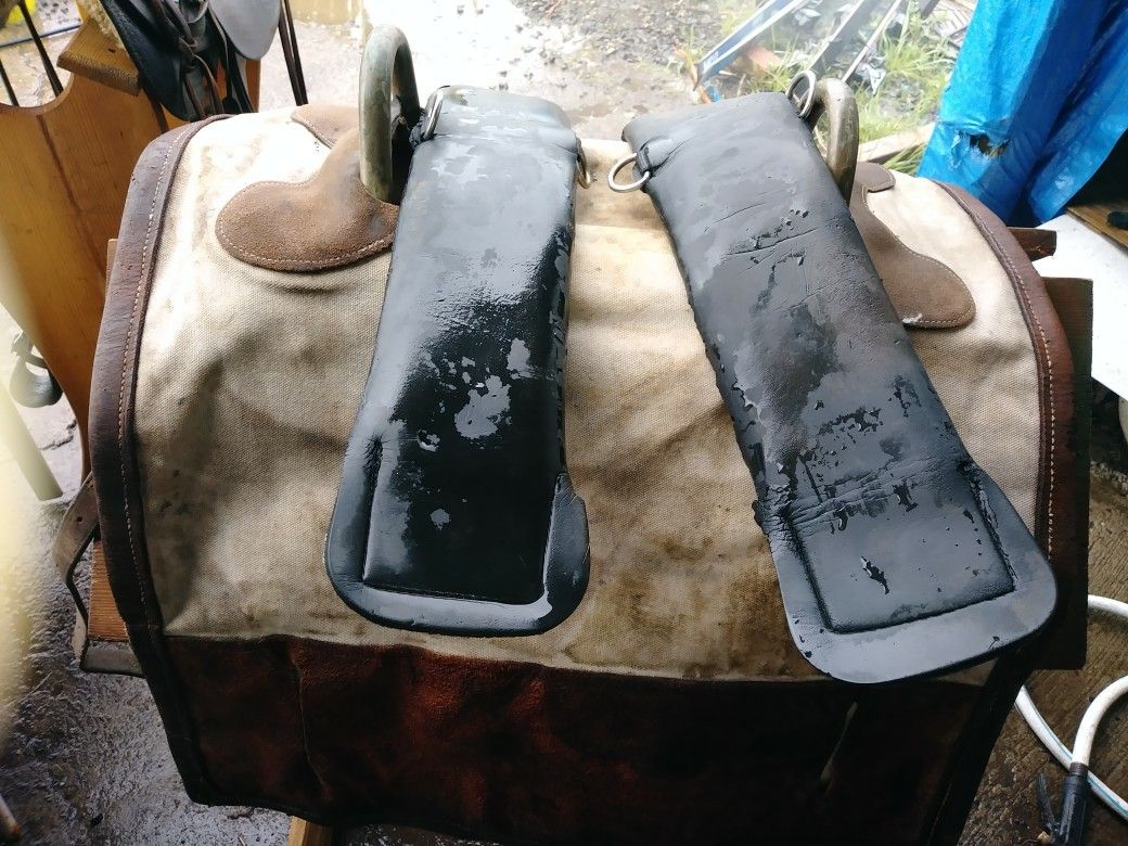 Various saddles sold together with stands