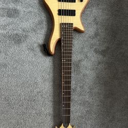 Left Handed Schecter Custom 6 String Bass