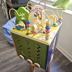B. toys Zany Zoo Wooden Activity Cube in green