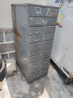 Vintage cabinet 54"Hx20"Wx28.5"D. Metal frame aluminum drawers. Some drawers don't close all the way. Miner cracks on the aluminum drawers.