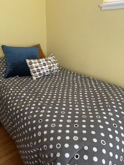 Twin bed with mattress and box spring