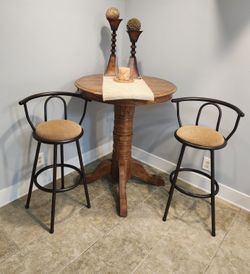 Pub style, round oak pedestal table. And 2 Chairs