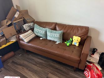Couch with pillows & plushies