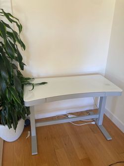 Adjustable height desk